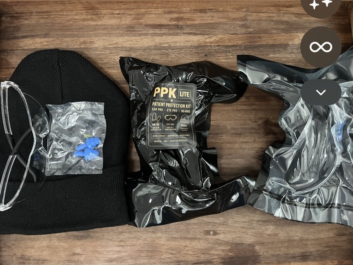 PPK Lite kit displayed with beanie, eye protection, ear protection, and packaging